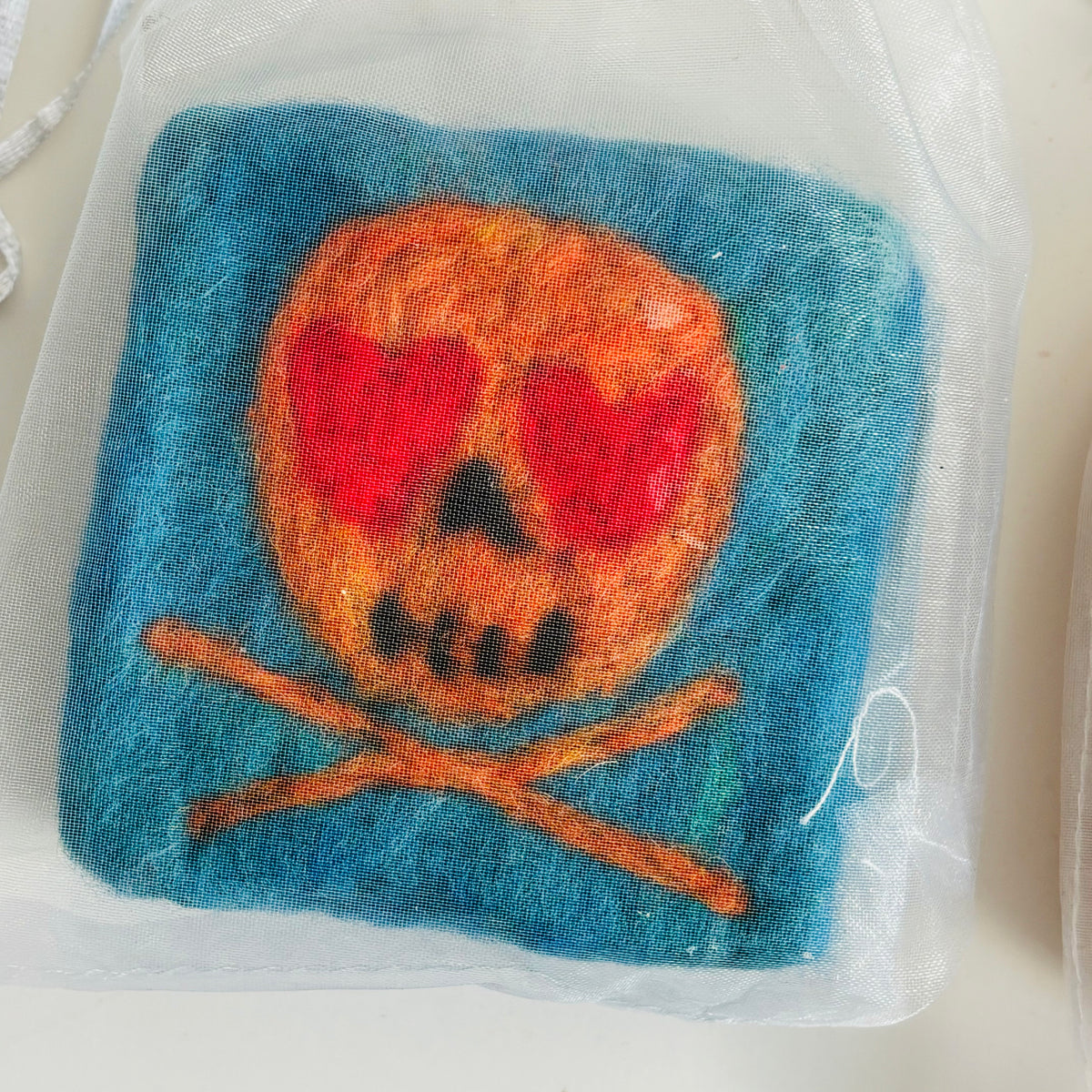 Skull Felted Soap – Heart-Eyed Wool Soap Saver with Handmade Soap